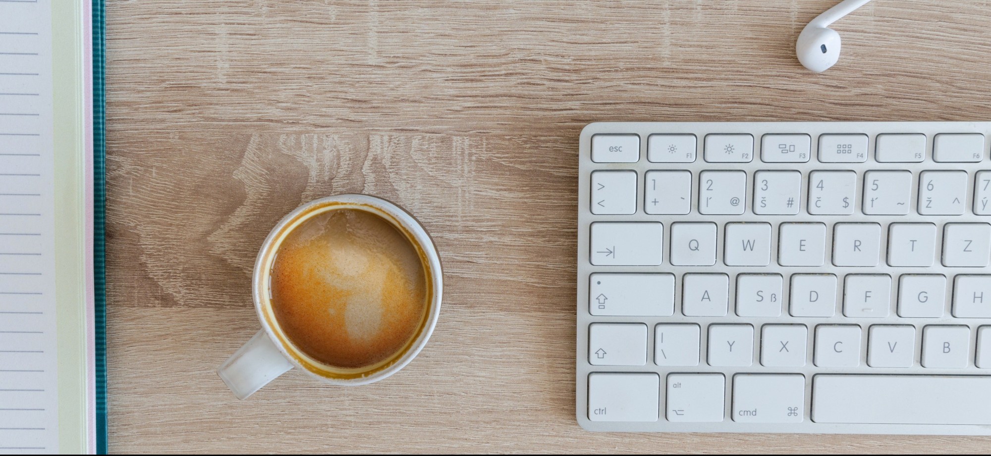 Keyboard and coffee mug