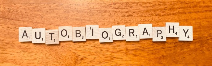 Scrabble tiles spelling "Autobiography"