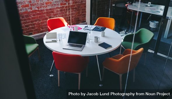 empty meeting room - chairs around a round table